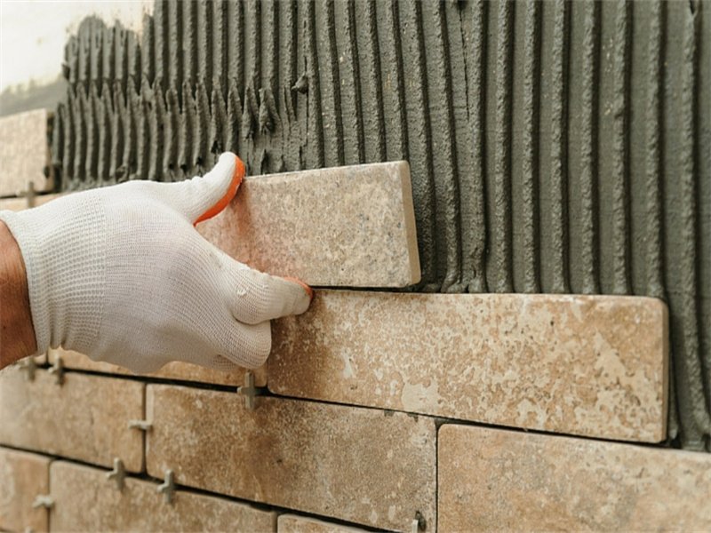 illustrating the mortar adhesion to bricks or tiles