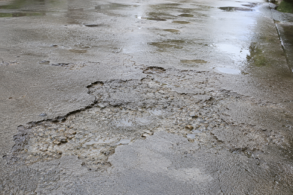 Concrete surface damaged by tropical rain Concrete surface damaged by tropical rain