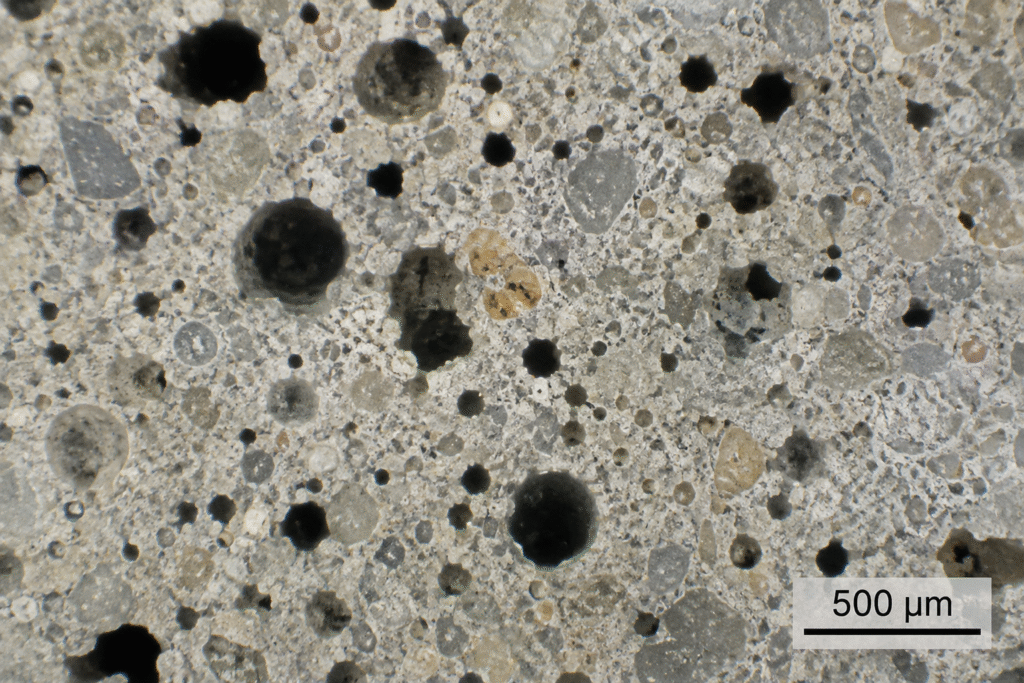 Microscopic view of concrete pores from excess water